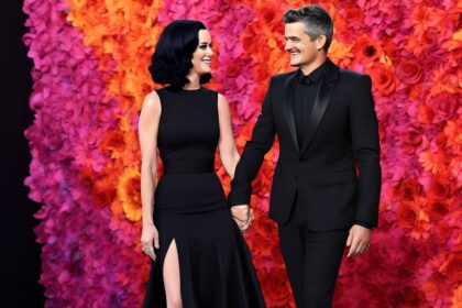 Katy Perry and Orlando Bloom Coordinate in Matching Black Outfits, Holding Hands at the 2024 Breakthrough Prize Ceremony
