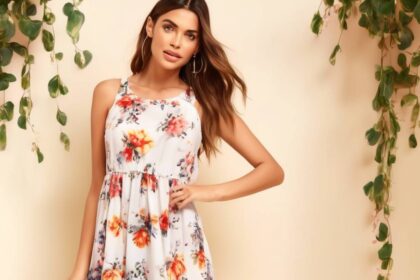 Add a touch of romance to your summer wardrobe with this Floral Mini Babydoll Dress
